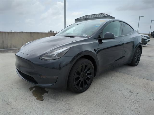 used 2024 Tesla Model Y car, priced at $32,307