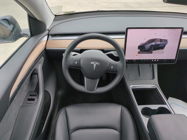 used 2024 Tesla Model Y car, priced at $32,307