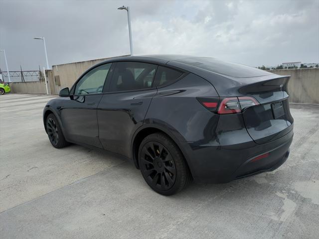 used 2024 Tesla Model Y car, priced at $32,307