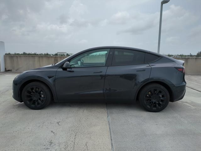 used 2024 Tesla Model Y car, priced at $32,307