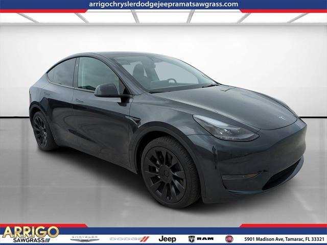 used 2024 Tesla Model Y car, priced at $32,307