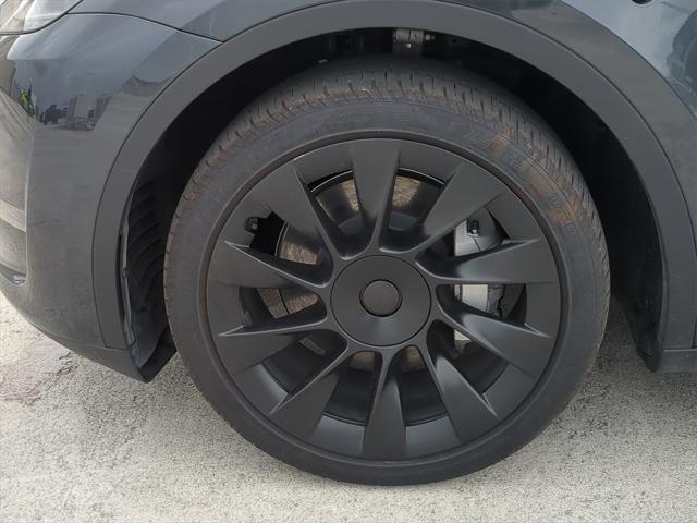 used 2024 Tesla Model Y car, priced at $32,307