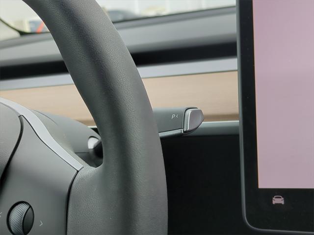 used 2024 Tesla Model Y car, priced at $32,307