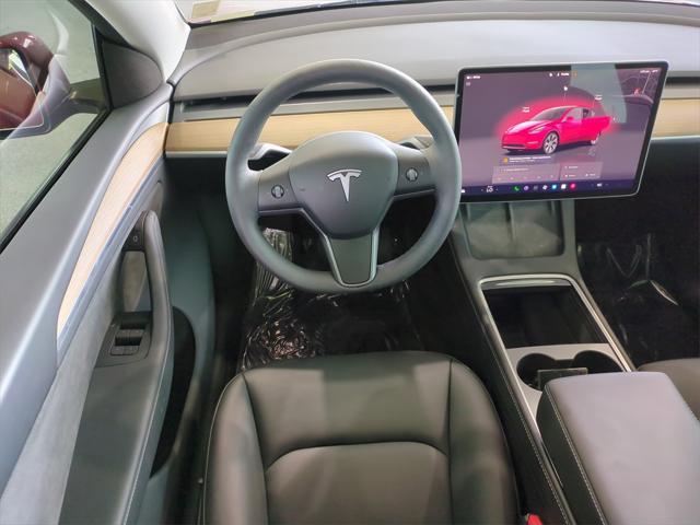 used 2024 Tesla Model Y car, priced at $32,387