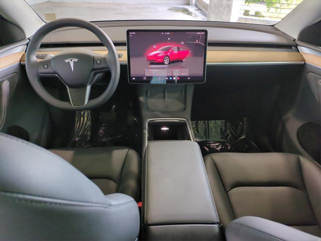 used 2024 Tesla Model Y car, priced at $32,387