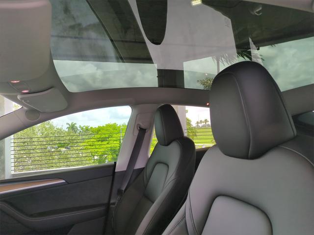 used 2024 Tesla Model Y car, priced at $32,387