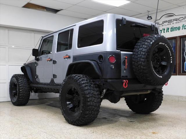 used 2014 Jeep Wrangler Unlimited car, priced at $26,979