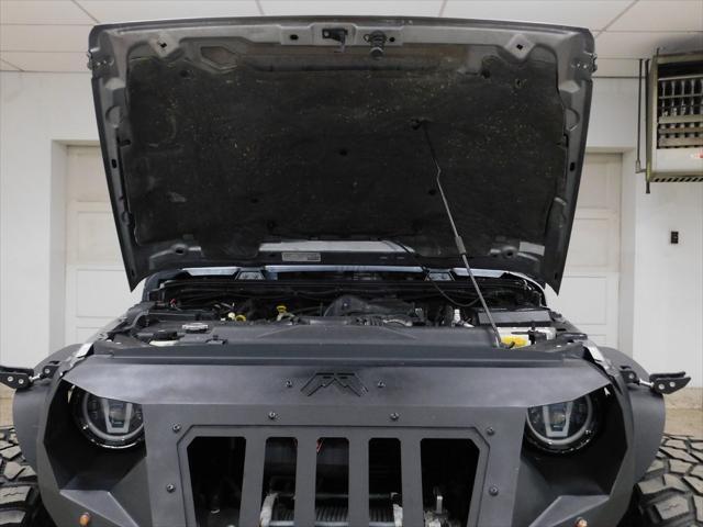 used 2014 Jeep Wrangler Unlimited car, priced at $26,979