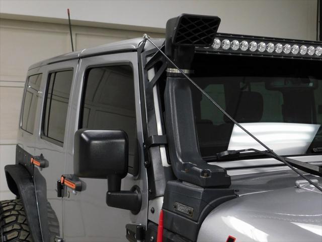 used 2014 Jeep Wrangler Unlimited car, priced at $26,979