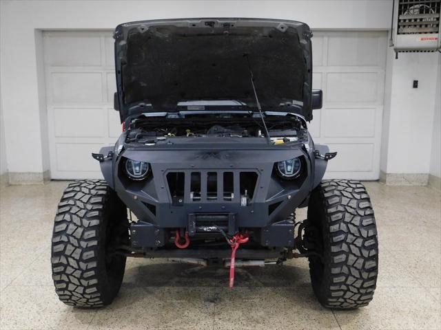 used 2014 Jeep Wrangler Unlimited car, priced at $26,979