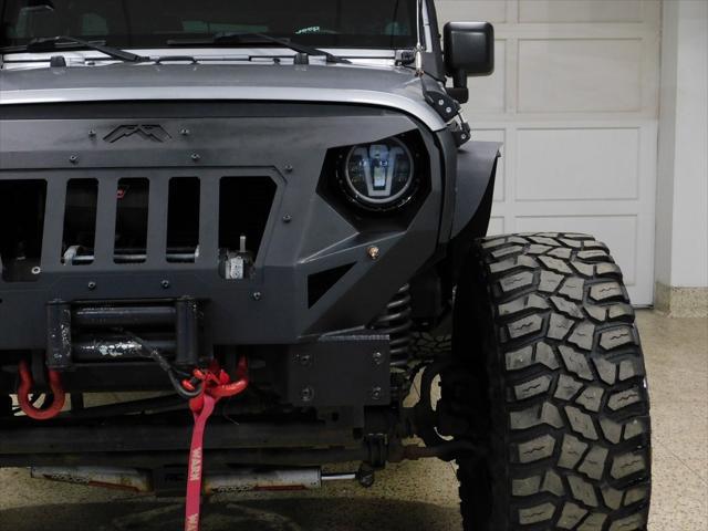 used 2014 Jeep Wrangler Unlimited car, priced at $26,979