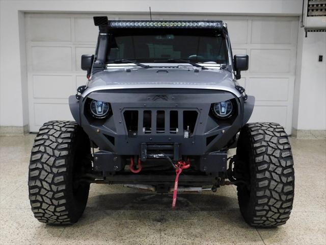 used 2014 Jeep Wrangler Unlimited car, priced at $26,979