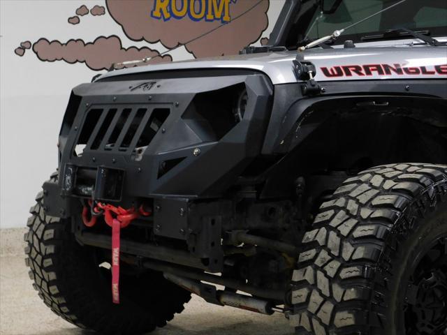 used 2014 Jeep Wrangler Unlimited car, priced at $26,979