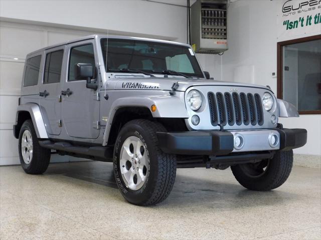 used 2015 Jeep Wrangler Unlimited car, priced at $22,537