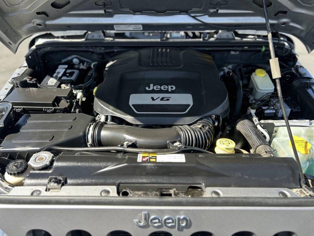 used 2014 Jeep Wrangler Unlimited car, priced at $16,999