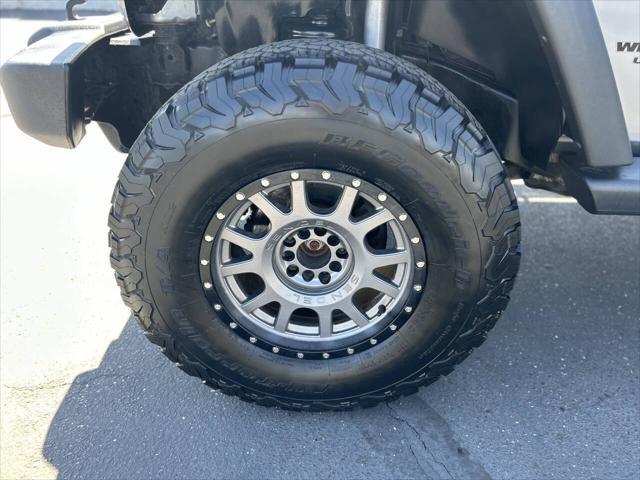 used 2014 Jeep Wrangler Unlimited car, priced at $18,999