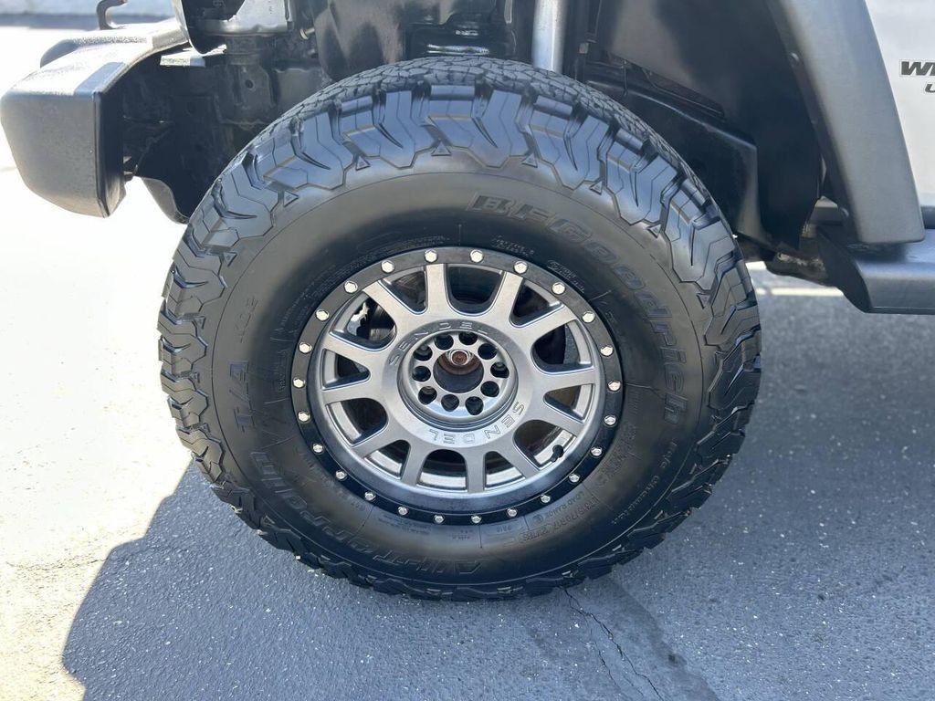 used 2014 Jeep Wrangler Unlimited car, priced at $16,999