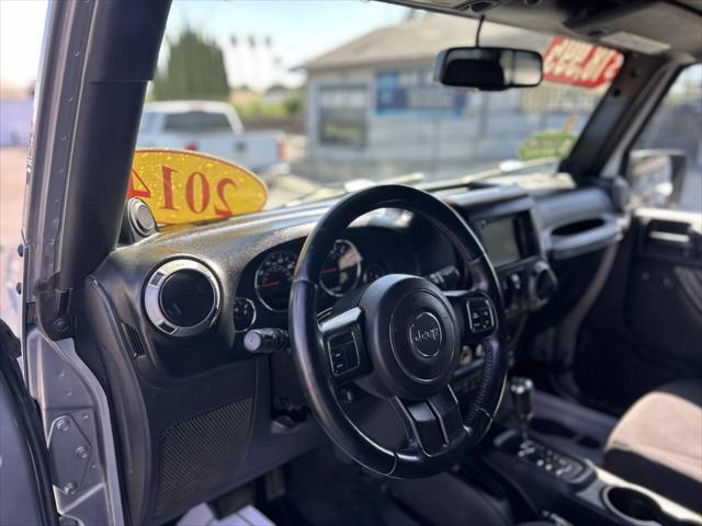used 2014 Jeep Wrangler Unlimited car, priced at $18,999