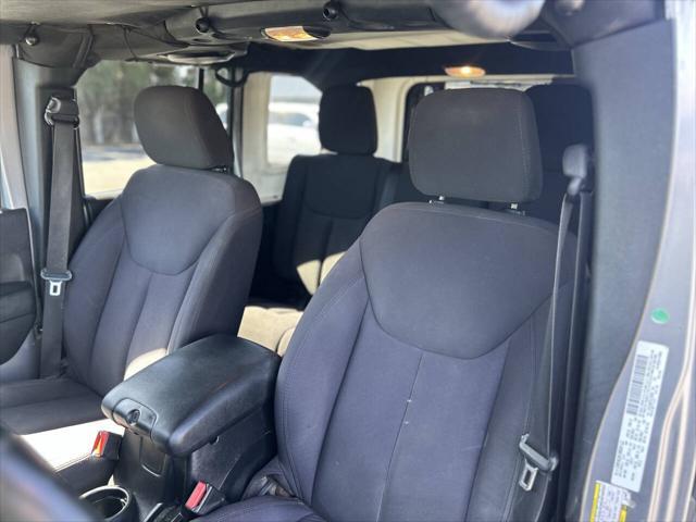 used 2014 Jeep Wrangler Unlimited car, priced at $18,999
