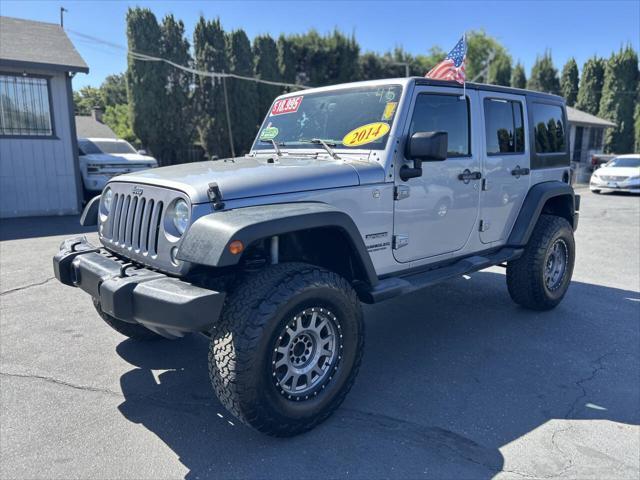 used 2014 Jeep Wrangler Unlimited car, priced at $18,999