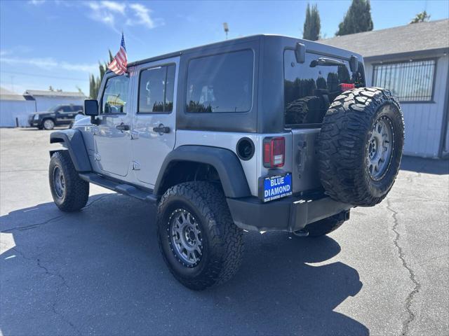 used 2014 Jeep Wrangler Unlimited car, priced at $18,999