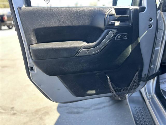 used 2014 Jeep Wrangler Unlimited car, priced at $18,999
