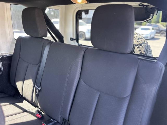 used 2014 Jeep Wrangler Unlimited car, priced at $18,999