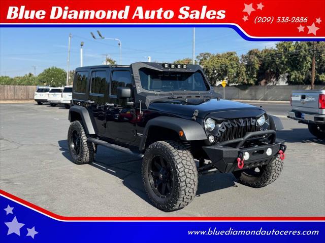 used 2015 Jeep Wrangler Unlimited car, priced at $23,999