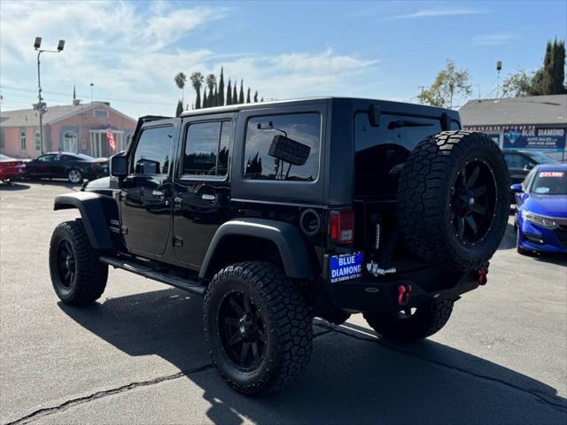 used 2015 Jeep Wrangler Unlimited car, priced at $23,999