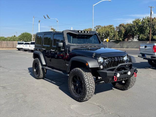 used 2015 Jeep Wrangler Unlimited car, priced at $23,999