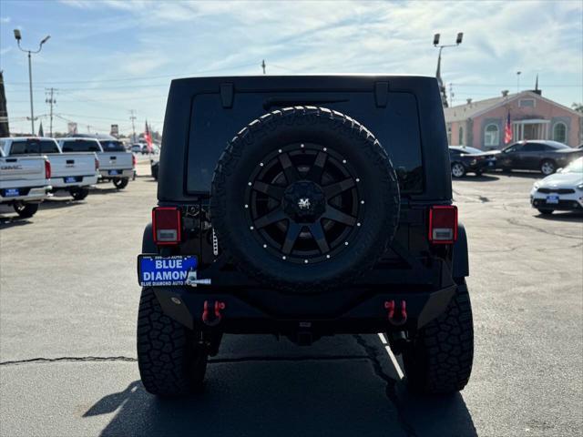 used 2015 Jeep Wrangler Unlimited car, priced at $23,999