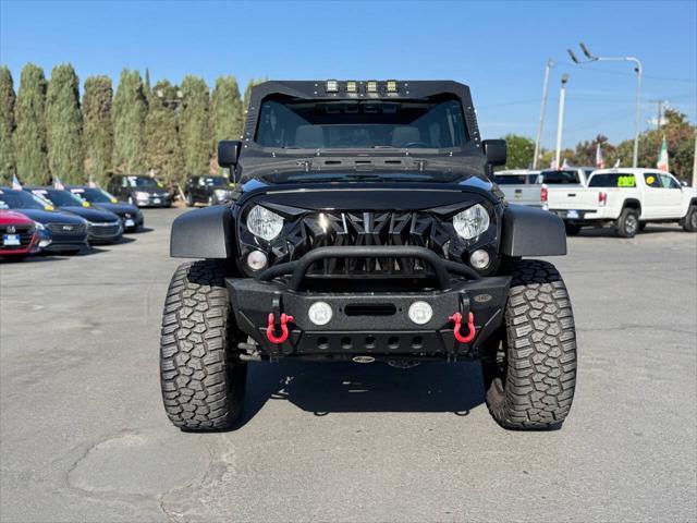 used 2015 Jeep Wrangler Unlimited car, priced at $23,999