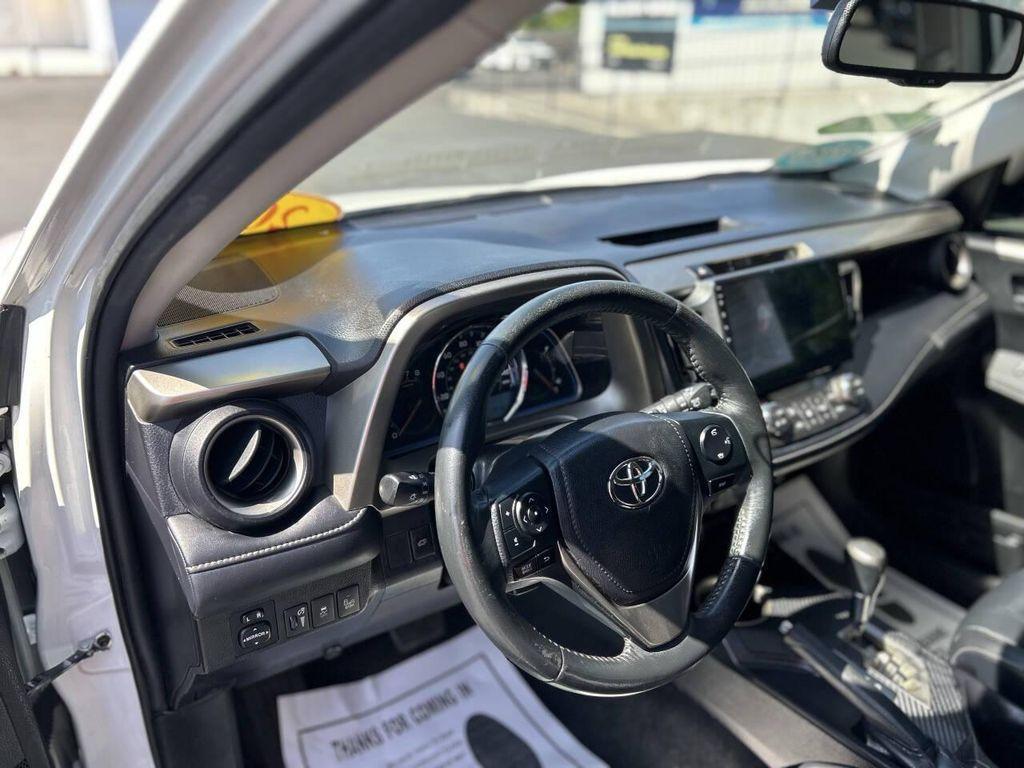 used 2014 Toyota RAV4 car, priced at $13,999