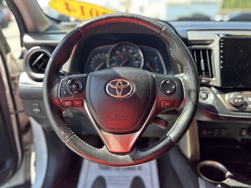 used 2014 Toyota RAV4 car, priced at $13,999
