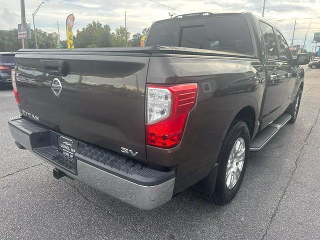 used 2019 Nissan Titan car, priced at $17,990