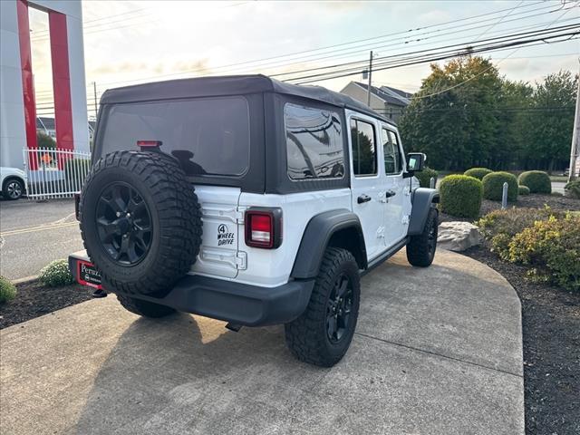 used 2021 Jeep Wrangler Unlimited car, priced at $32,956