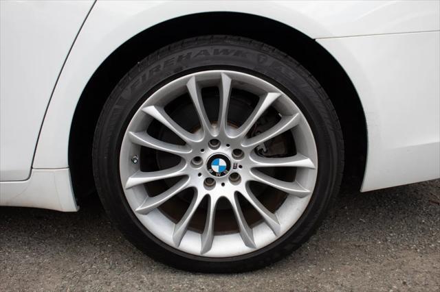 used 2014 BMW 750 car, priced at $14,995