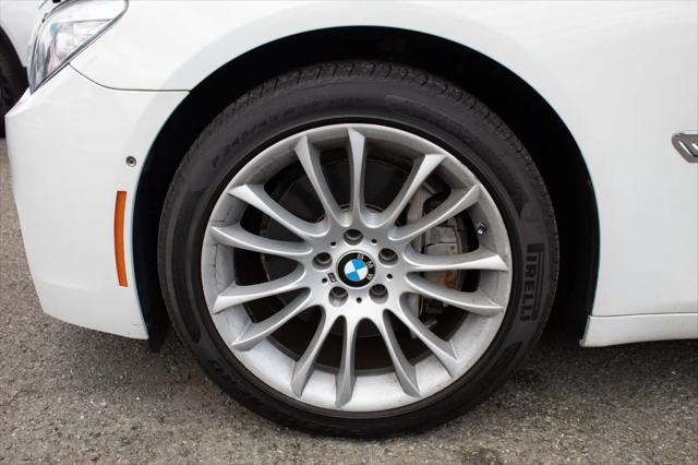 used 2014 BMW 750 car, priced at $14,995