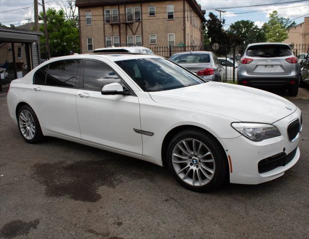 used 2014 BMW 750 car, priced at $14,995