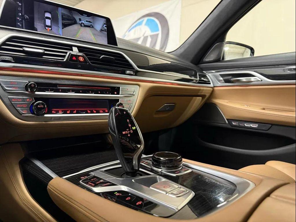 used 2016 BMW 750 car, priced at $13,495