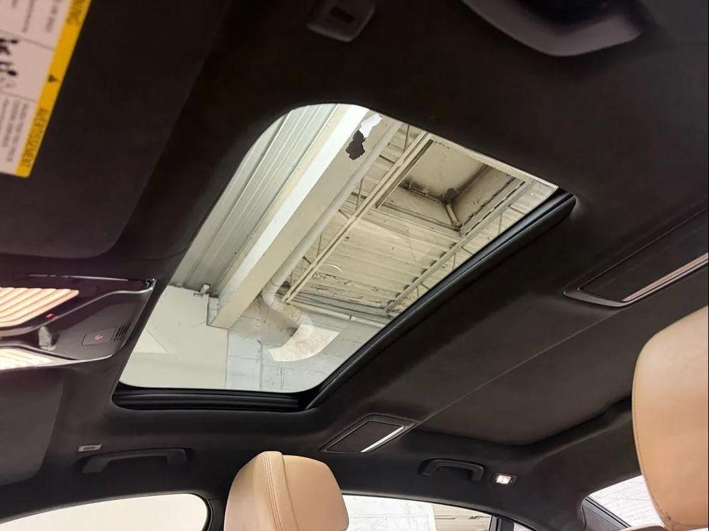 used 2016 BMW 750 car, priced at $13,495