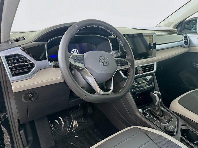 new 2025 Volkswagen Taos car, priced at $30,921