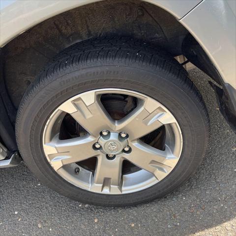 used 2011 Toyota RAV4 car, priced at $9,999