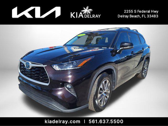 used 2021 Toyota Highlander Hybrid car, priced at $29,995