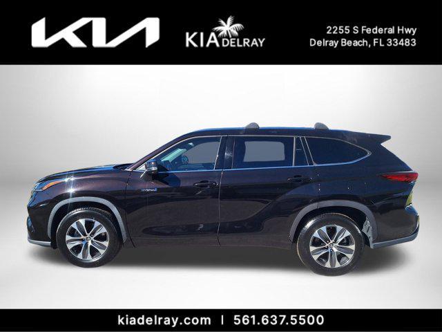 used 2021 Toyota Highlander Hybrid car, priced at $29,995