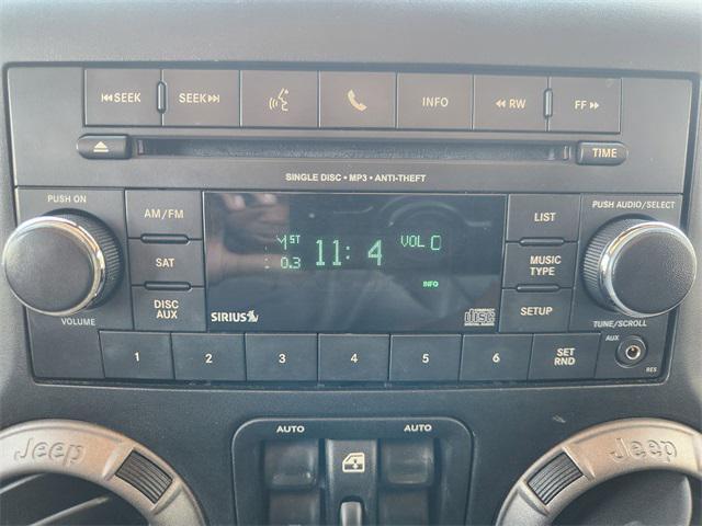 used 2015 Jeep Wrangler Unlimited car, priced at $18,922