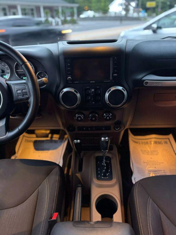 used 2015 Jeep Wrangler Unlimited car, priced at $18,995