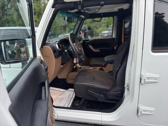 used 2015 Jeep Wrangler Unlimited car, priced at $18,995