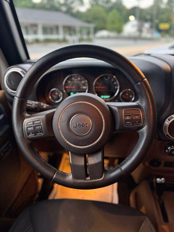 used 2015 Jeep Wrangler Unlimited car, priced at $18,995