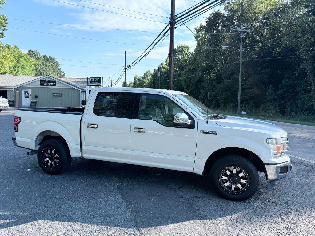 used 2018 Ford F-150 car, priced at $16,795